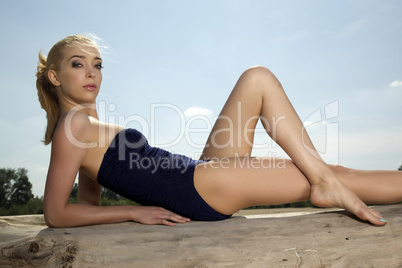 beautiful blonde woman in black swimwear