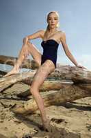 beautiful blonde woman in black swimwear