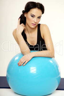 Woman with fitness ball