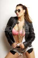 beautiful adult sensuality woman in black jacket and sunglasses