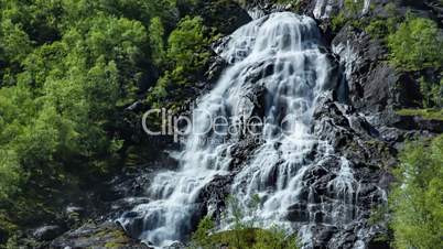 Aerial footage from Tvindefossen waterfall from the bird's-eye view, Norway