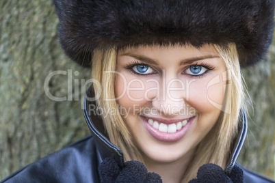 Beautiful Blond Woman With Blue Eyes in Fur Hat