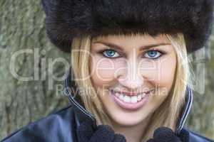 Beautiful Blond Woman With Blue Eyes in Fur Hat