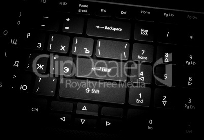 Electronic collection - laptop keyboard. The focus on the Enter