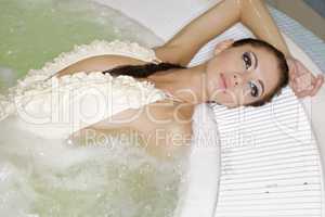 Young beautiful woman in jacuzzi