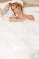 Woman in bath relaxing. Closeup of young woman in bathtub bathin