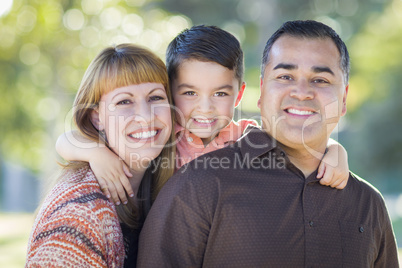 Young Mixed Race Family Portrait Outdoors