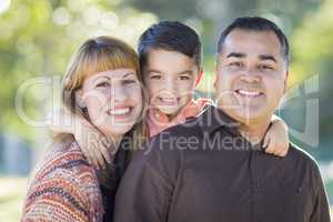 Young Mixed Race Family Portrait Outdoors