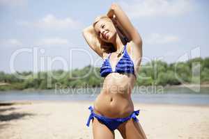 beautiful blonde woman in blue bikini