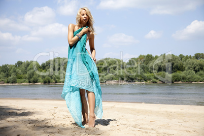 young fashion pretty sexy woman on the beach