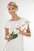 Young bride in white wedding dress happy smiling