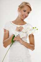 Young bride in white wedding dress happy smiling