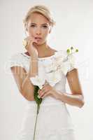 Young bride in white wedding dress happy smiling