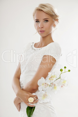 Young bride in white wedding dress happy smiling