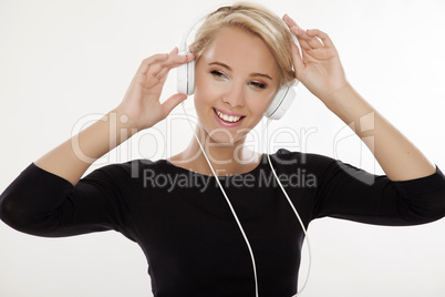 Beautiful girl is listen to the music