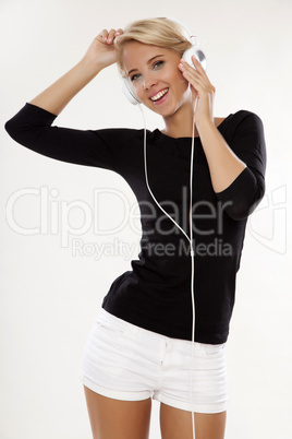Beautiful girl is listen to the music
