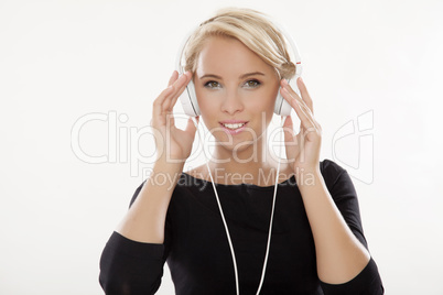 Beautiful girl is listen to the music