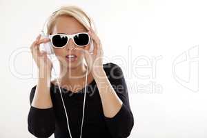 Beautiful girl is listen to the music