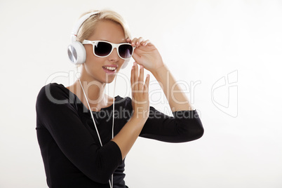 Beautiful girl is listen to the music