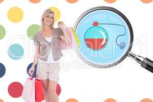 Composite image of happy blonde with shopping bags