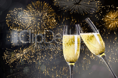 Composite image of champagne glasses clinking