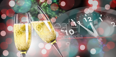 Composite image of champagne glasses clinking