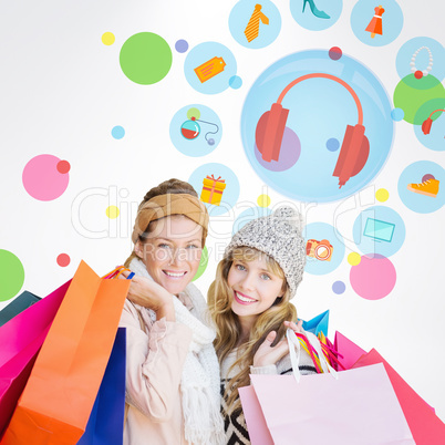 Composite image of smiling women looking at camera with shopping