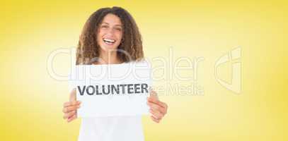 Composite image of smiling volunteer showing a poster
