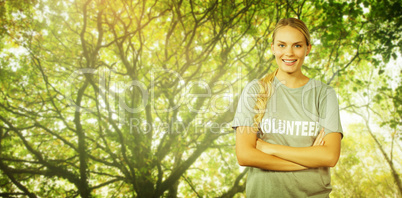Composite image of portrait of beautiful smiling woman with arms