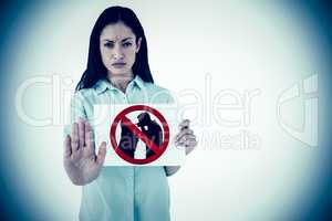 Composite image of woman showing card and saying stop