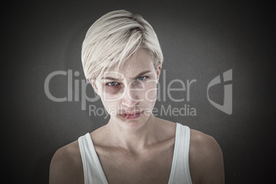 Composite image of upset woman looking at camera