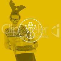 Composite image of happy geeky hipster holding presents