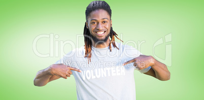 Composite image of happy volunteer in the park