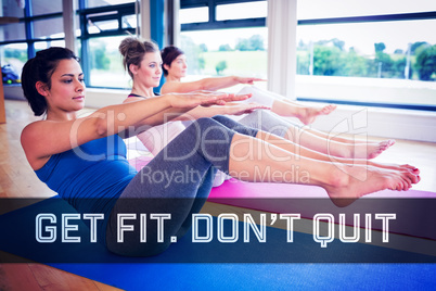 Composite image of women doing boat pose in yoga class