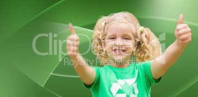Composite image of happy little girl in green with thumbs up