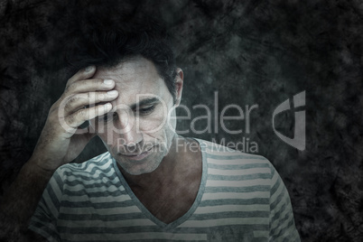 Composite image of upset man with hand on forehead Composite image of upset man with hand on forehead