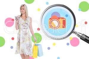 Composite image of elegant blonde with shopping bags