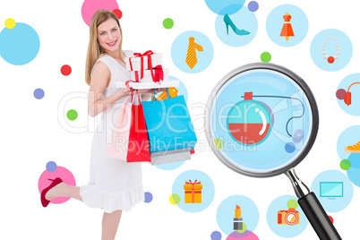 Composite image of pretty blonde with presents