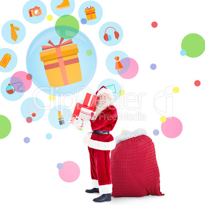 Composite image of santa claus carrying pile of gifts