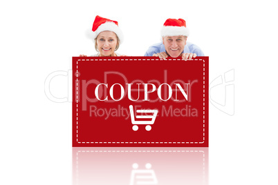 Composite image of festive couple showing poster