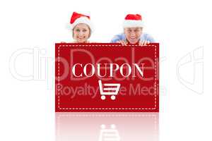 Composite image of festive couple showing poster