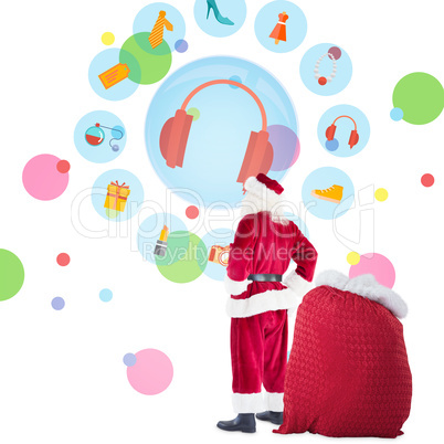 Composite image of happy santa with sack of gifts