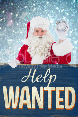 Composite image of santa claus holding alarm clock and sign