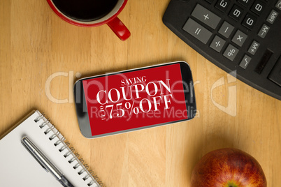 Composite image of smartphone on desk Composite image of smartphone on desk