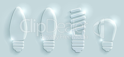 Glass lightbulbs set on grey background