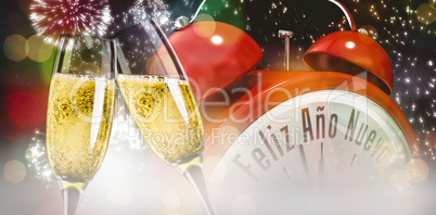 Composite image of champagne glasses clinking