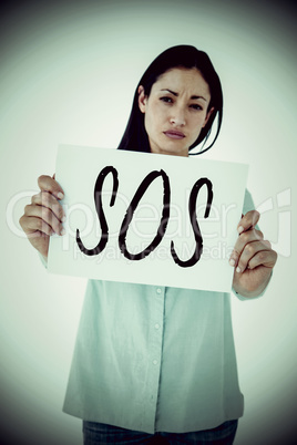 Composite image of sad woman showing sign