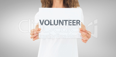 Composite image of volunteer showing a poster