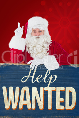 Composite image of smiling santa claus doing a gesture