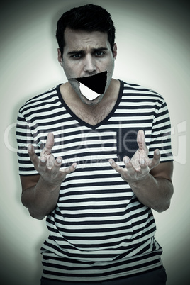 Composite image of astonished man gesturing over white backgroun